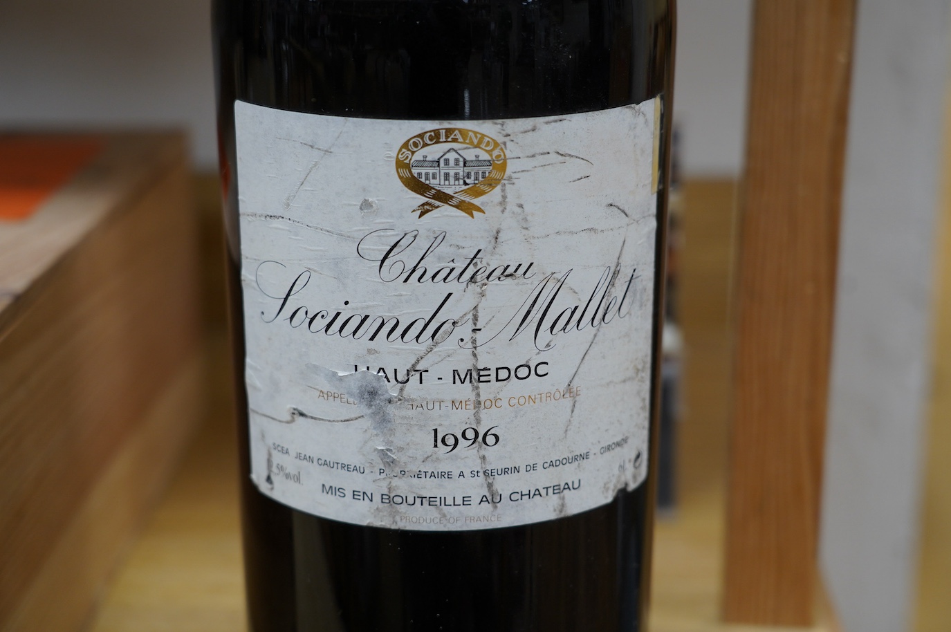 An Imperial (6lt.) bottle of Chateau Sociando Mallet 1996. Condition - fair to good, some cracks and losses to wax seal and damage to label